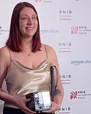 Photo of me receiving my award for Volunteer of the Year at the RNIB See Differently Awards ceremony.