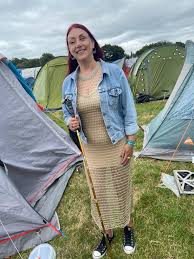 Me amongst the tents at Glastonbury. Denim jacket over a gold crochet dress!
